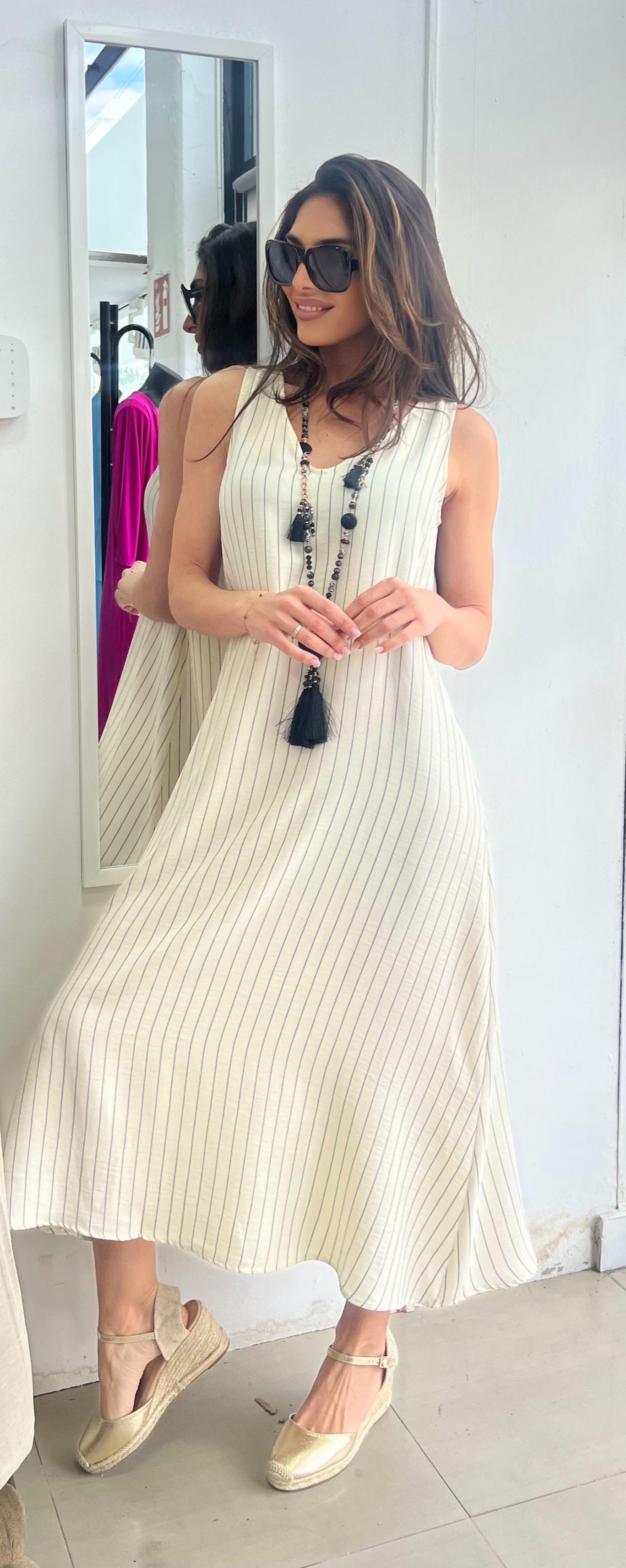 Vestido de tirantes en simil lino de rayas