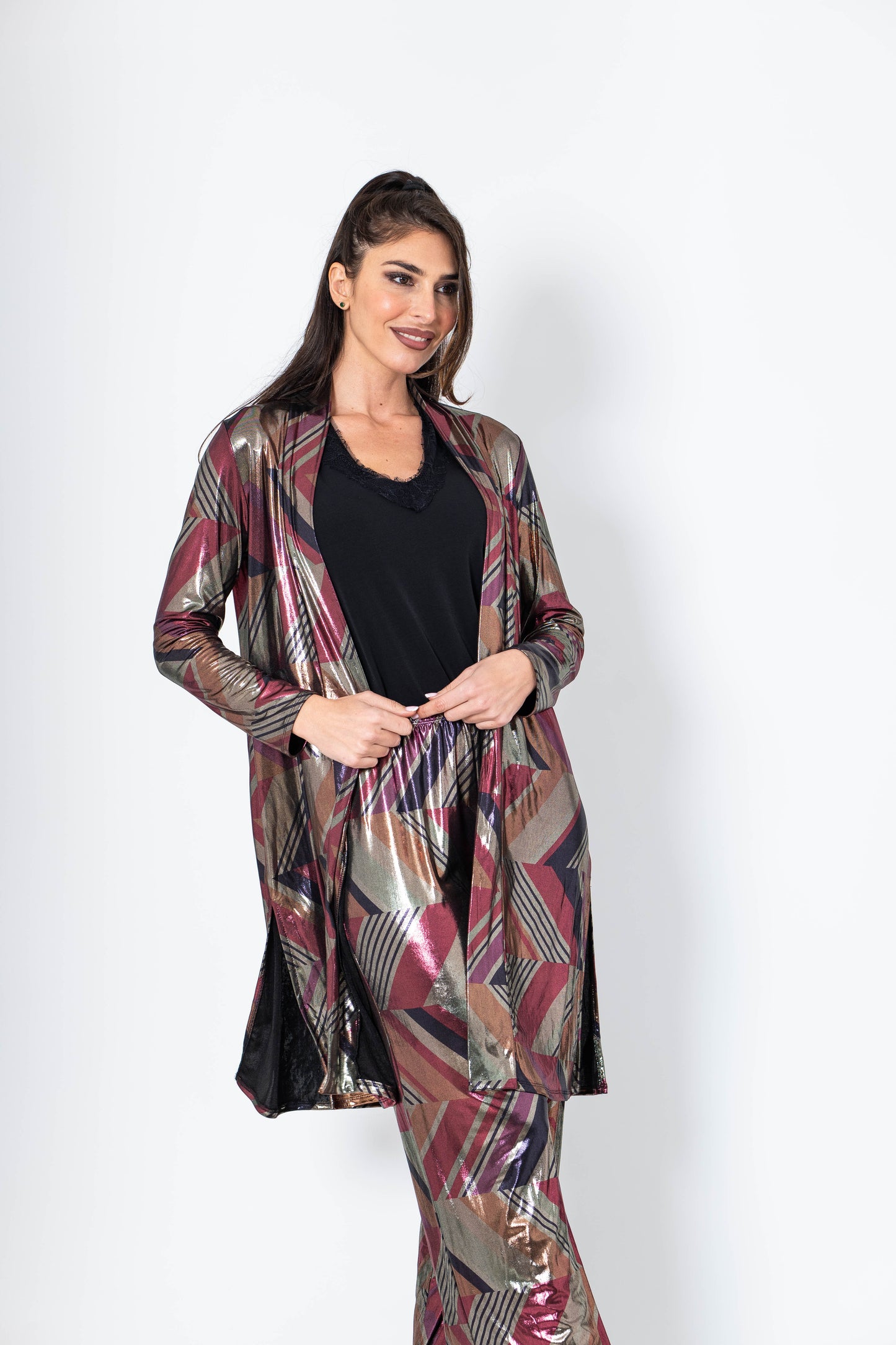 Conjunto de pantalón y chaqueta de brillo especial fiestas fuxia