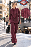Conjunto de punto con pantalón y bufanda”.