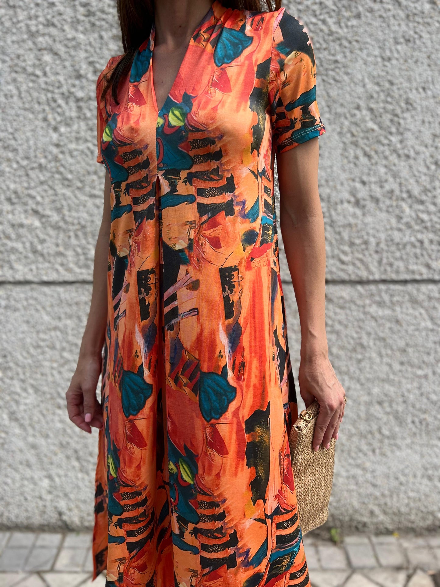 Vestido Midi escote pico estampado fondo naranja/choco