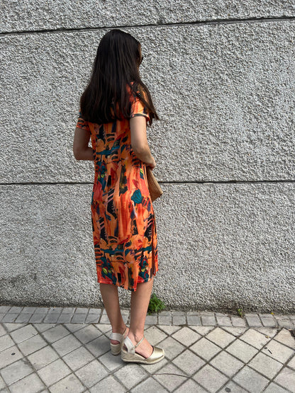Vestido Midi escote pico estampado fondo naranja/choco