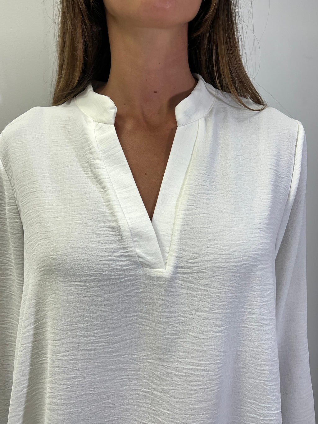 Blusa recta cuello maho manga larga