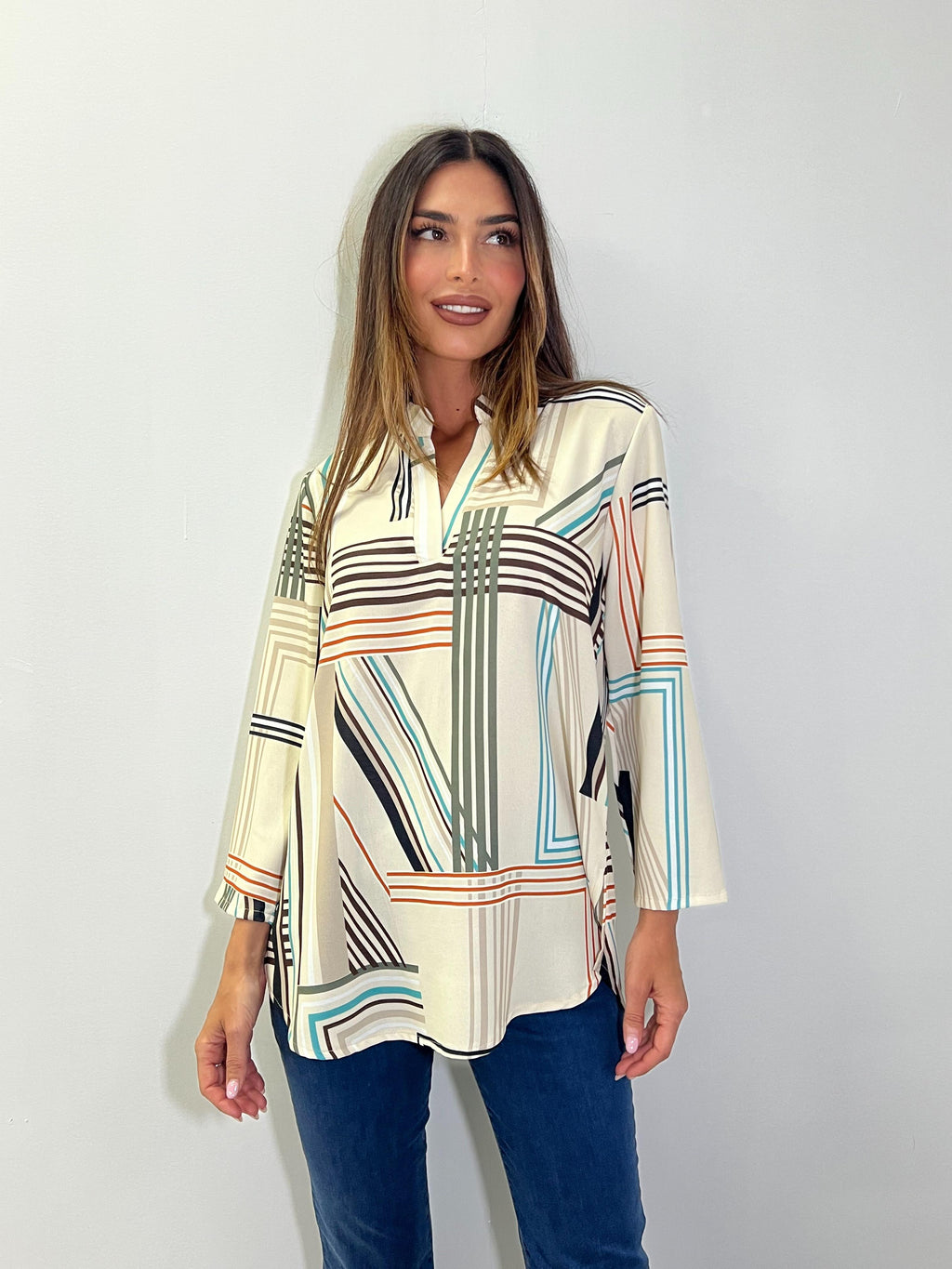 Blusa recta cuello maho manga larga estampada